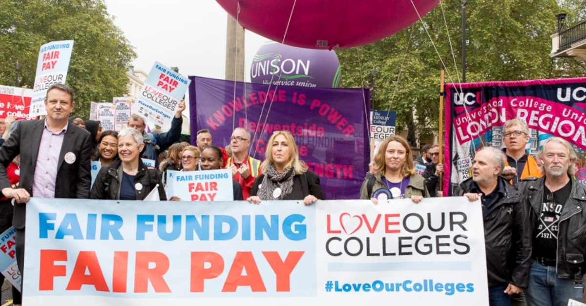 UCU members holding a banner that says 'fair funding fair pay'