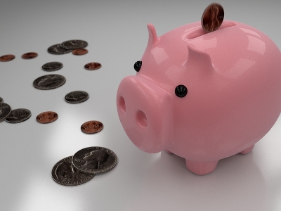 Image of a piggy bank and some coins