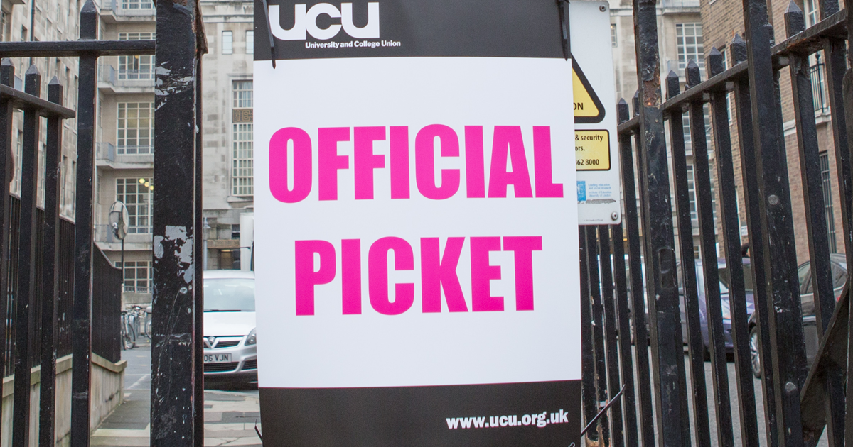 Official picket sign attached to railings